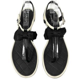 CHANEL White &‎ Black Quilted Bow Flat Sandals – Size 41.5